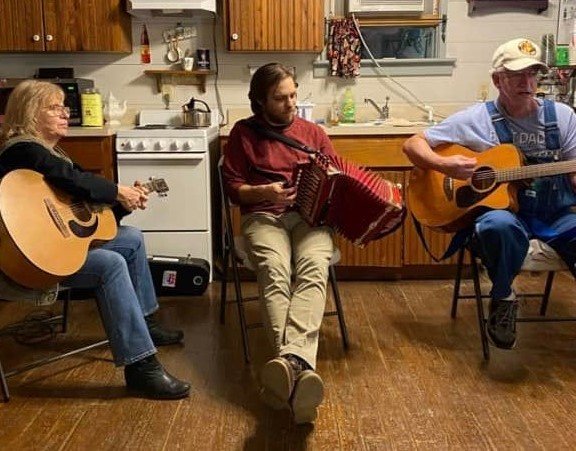 Jakob Goodwin playing the accordion at a Cajun jam